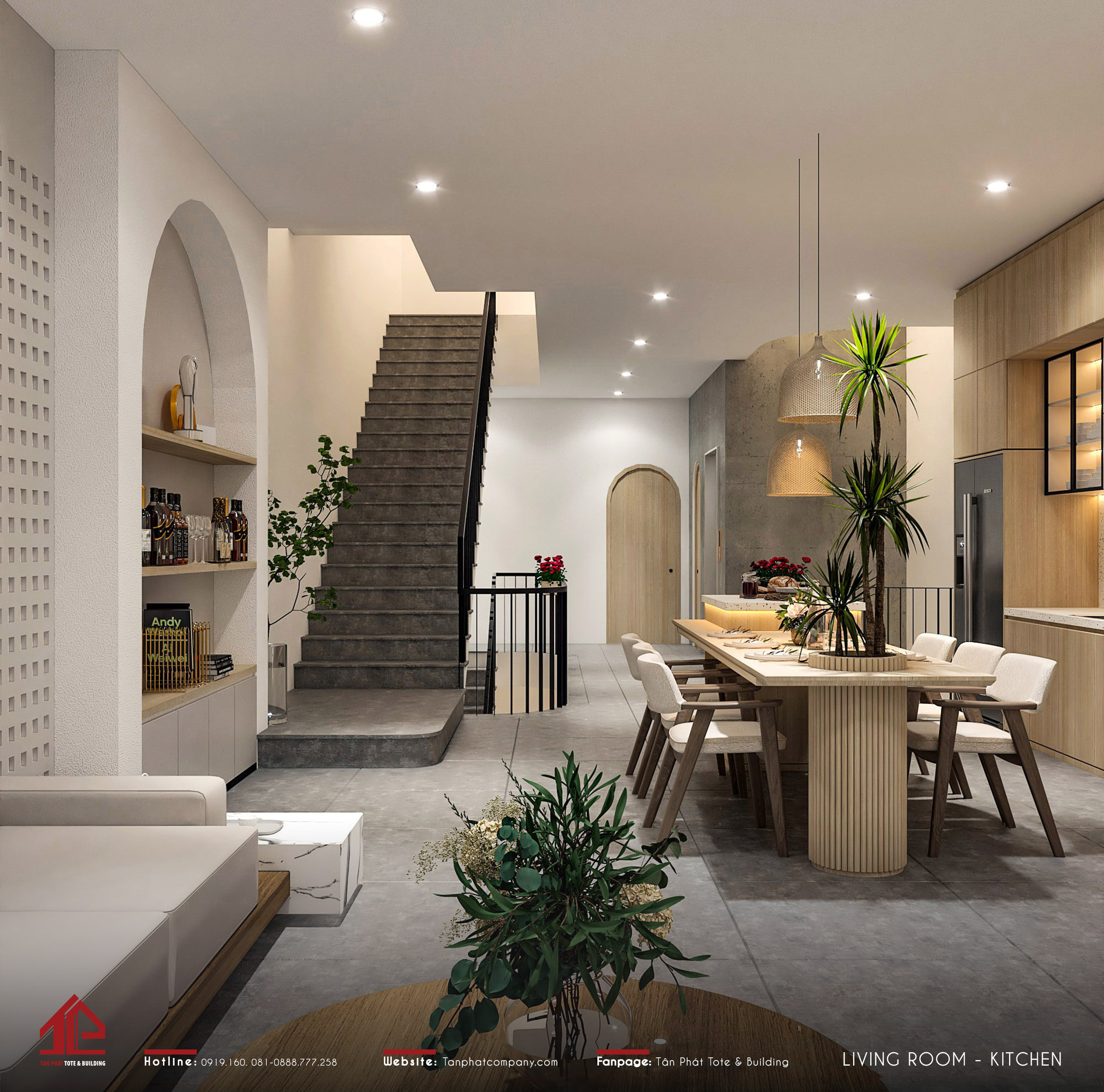 Phòng khách được thiết kế liền bếp với không gian rộng thoáng nhờ tone màu sáng và bố cục gọn gàng.