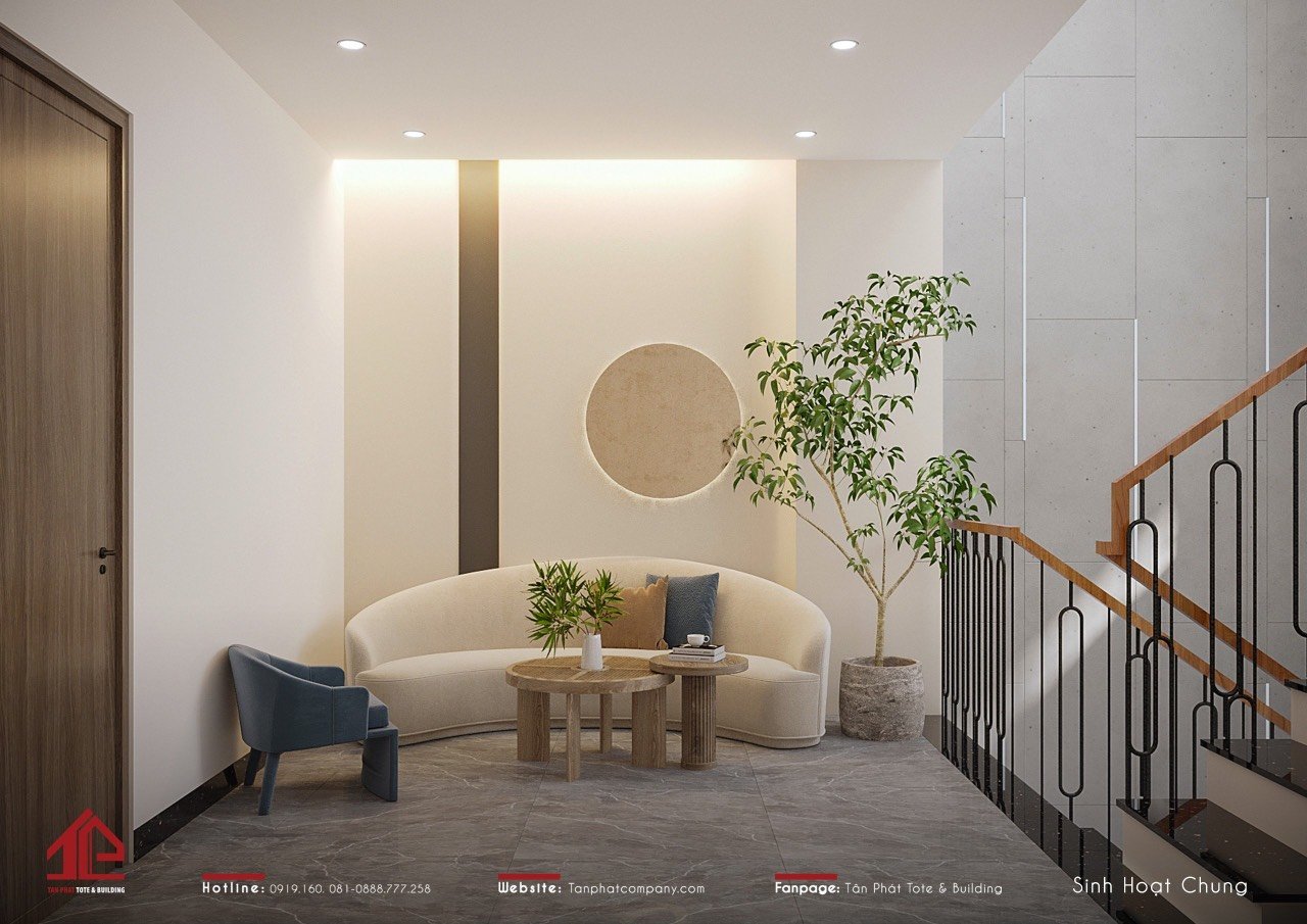 Hành lang tầng 2 được thiết kế thành khu vực sinh hoạt chung với cách bài trí khoa học: trung tâm là bộ sofa cong màu trắng kem ấn tượng, 1 ghế sofa đơn màu xanh dương làm điểm nhấn và chiếc bàn trà gỗ xinh xắn. Đặc biệt, trên tường còn được trang trí bằng chiếc đèn đồng nhật thực theo phong cách tối giản, góp phần làm tăng tính nghệ thuật cho không gian.